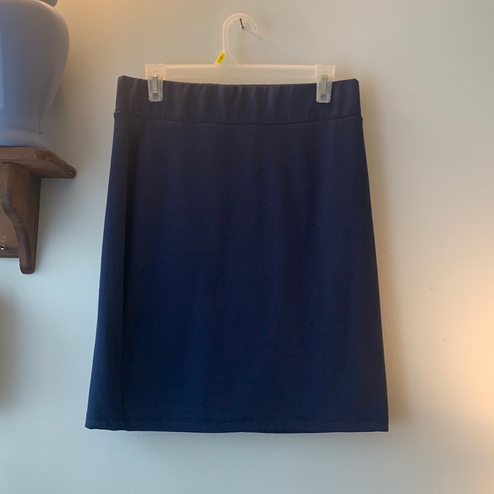 Navy blue pencil skirt, size medium.